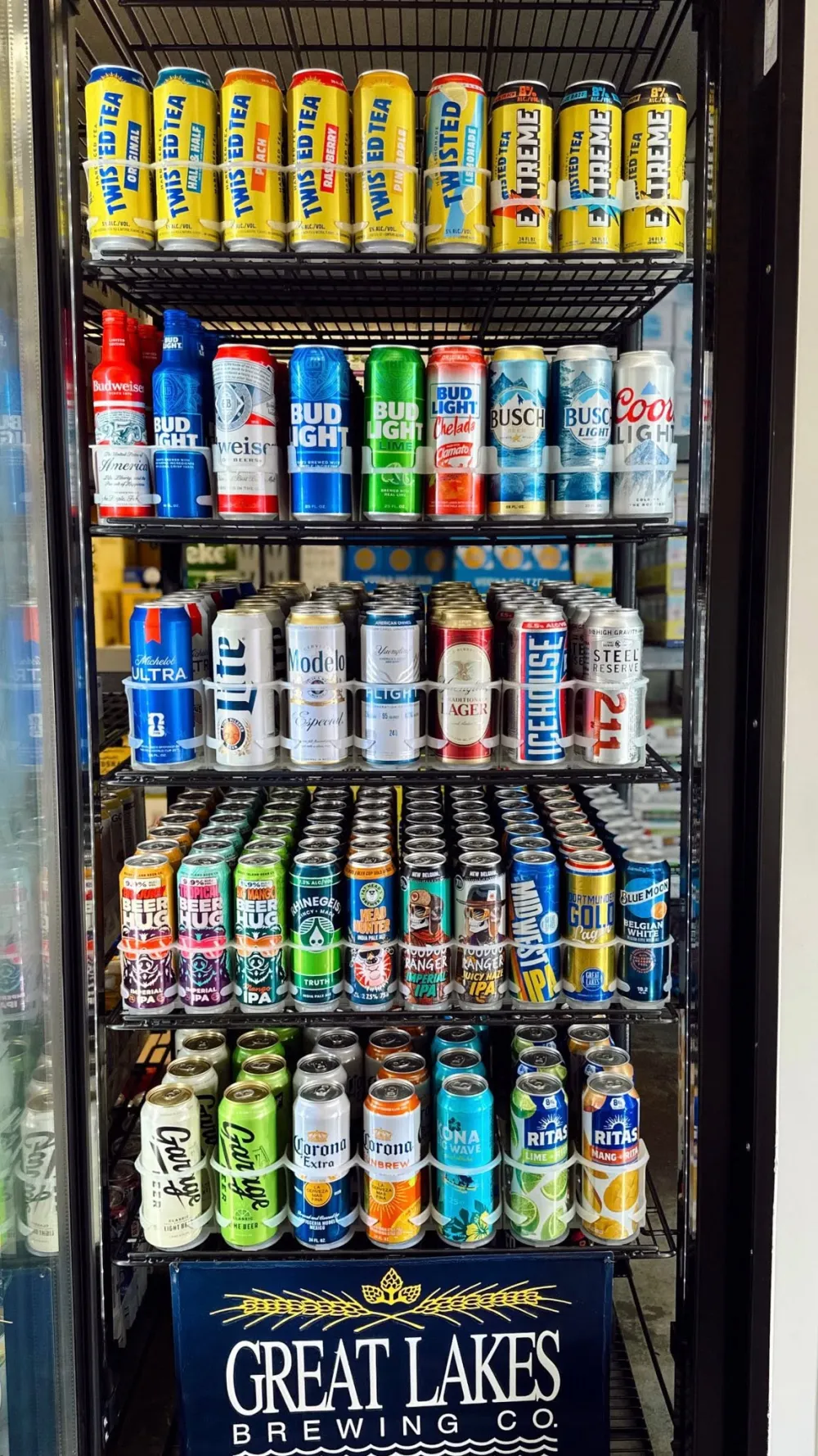 Cooler with summer beers, hard ciders, and ready-to-drink bottles