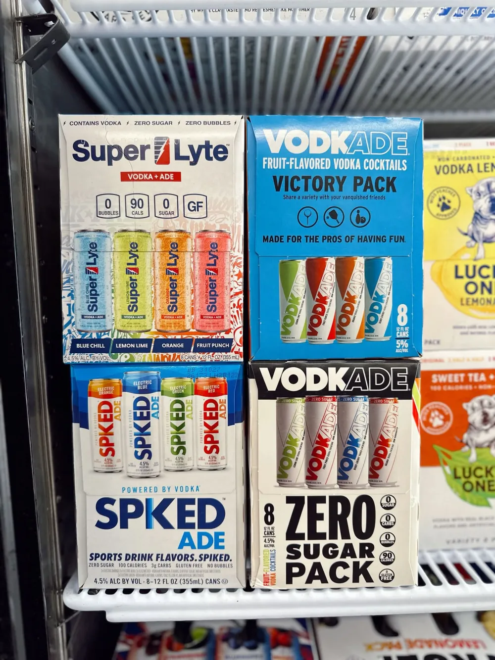 Vodka-ade variety packs on a cooler shelf